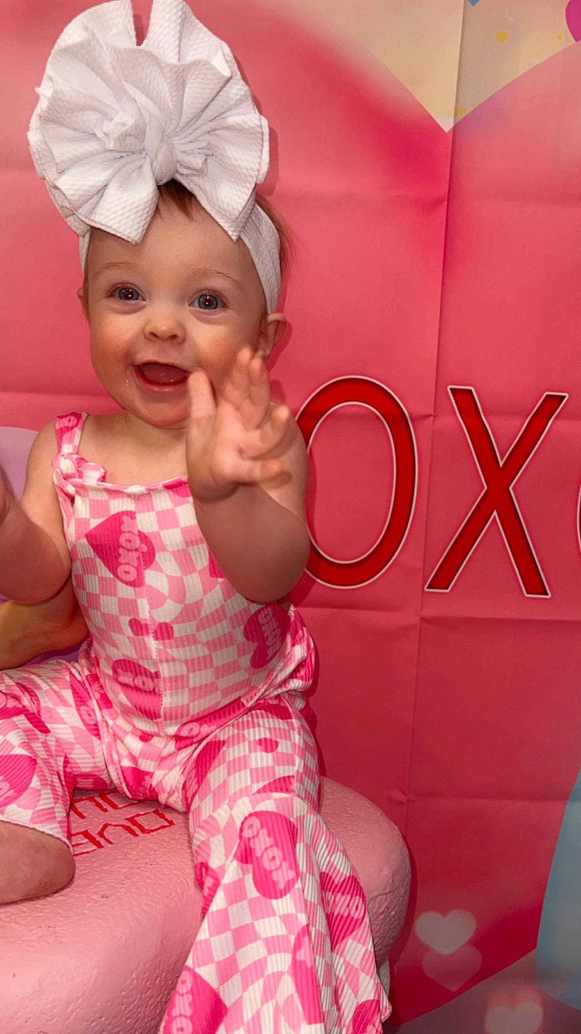 Raelynn joined the competition — help win amazing prizes! baby, baby_toddler_clothing, cap, child, eye, facial_expression, fashion_accessory, finger, font, fun, happy, headwear, joy, magenta, person, pink, shorts, skin, sleeve, smile
