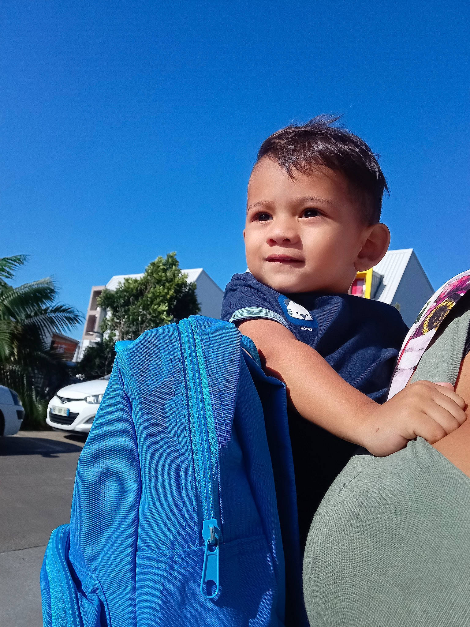 Keylian Kendrix participe au concours pour gagner de l'argent avec cette photo : baby, child, cool, electric_blue, event, formal_wear, fun, gesture, happy, leisure, person, shoulder, sky, sleeve, tire, toddler, tourism, tradition, travel, tree