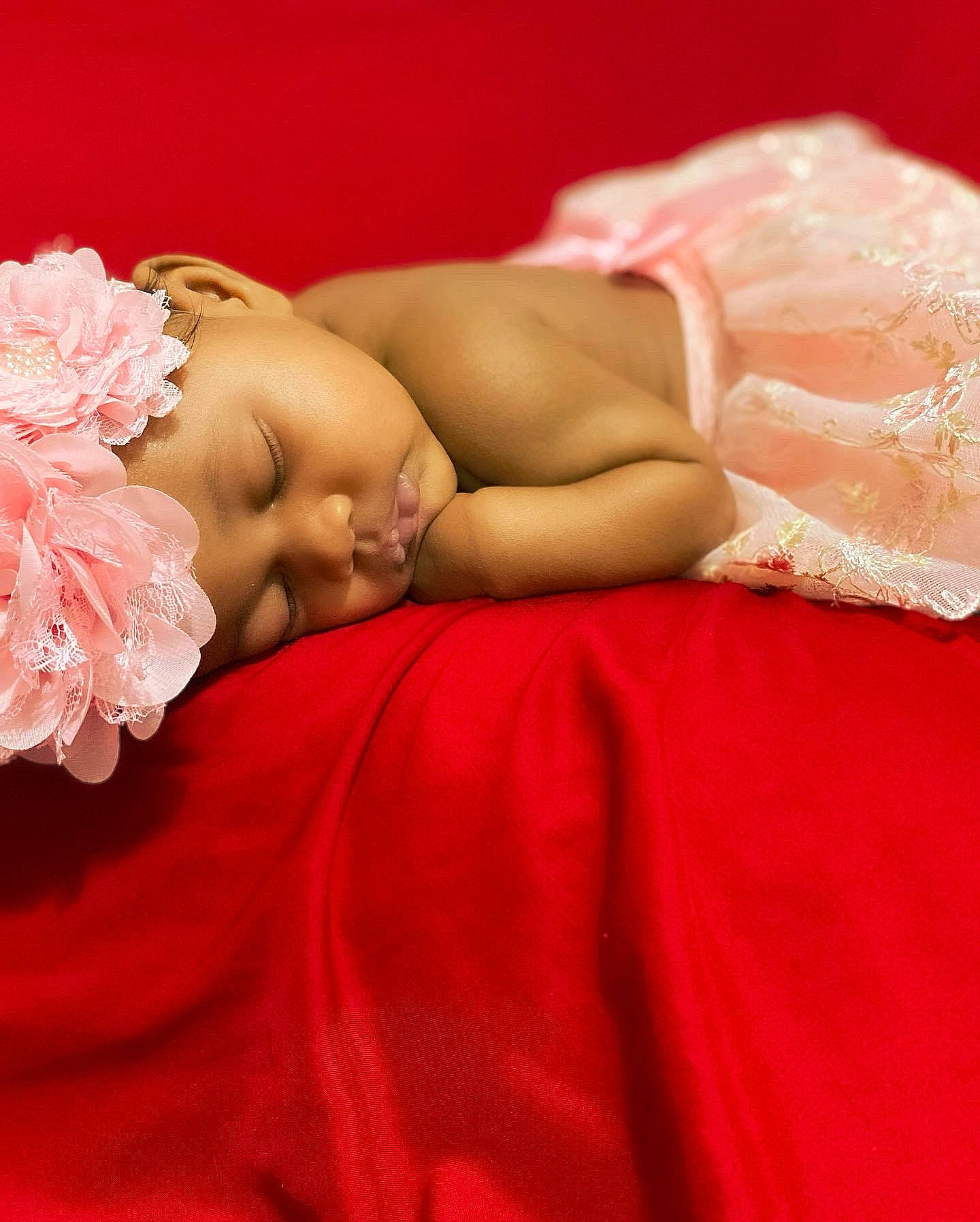 Khloé Chanel joined the competition — help win amazing prizes! arm, baby, chest, comfort, eye, finger, flower, hair, hairstyle, hand, head, headgear, headwear, human_body, lip, mouth, neck, person, pink, shoulder