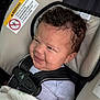 Lakiyah is registered to the contest to win money with this photo: baby, car_seat, curly_hair, smiling, child, infant, blanket, toy, beads, safety_harness, seatbelt, clothing, indoor, closeup, face, person, happy, cute, head, seat