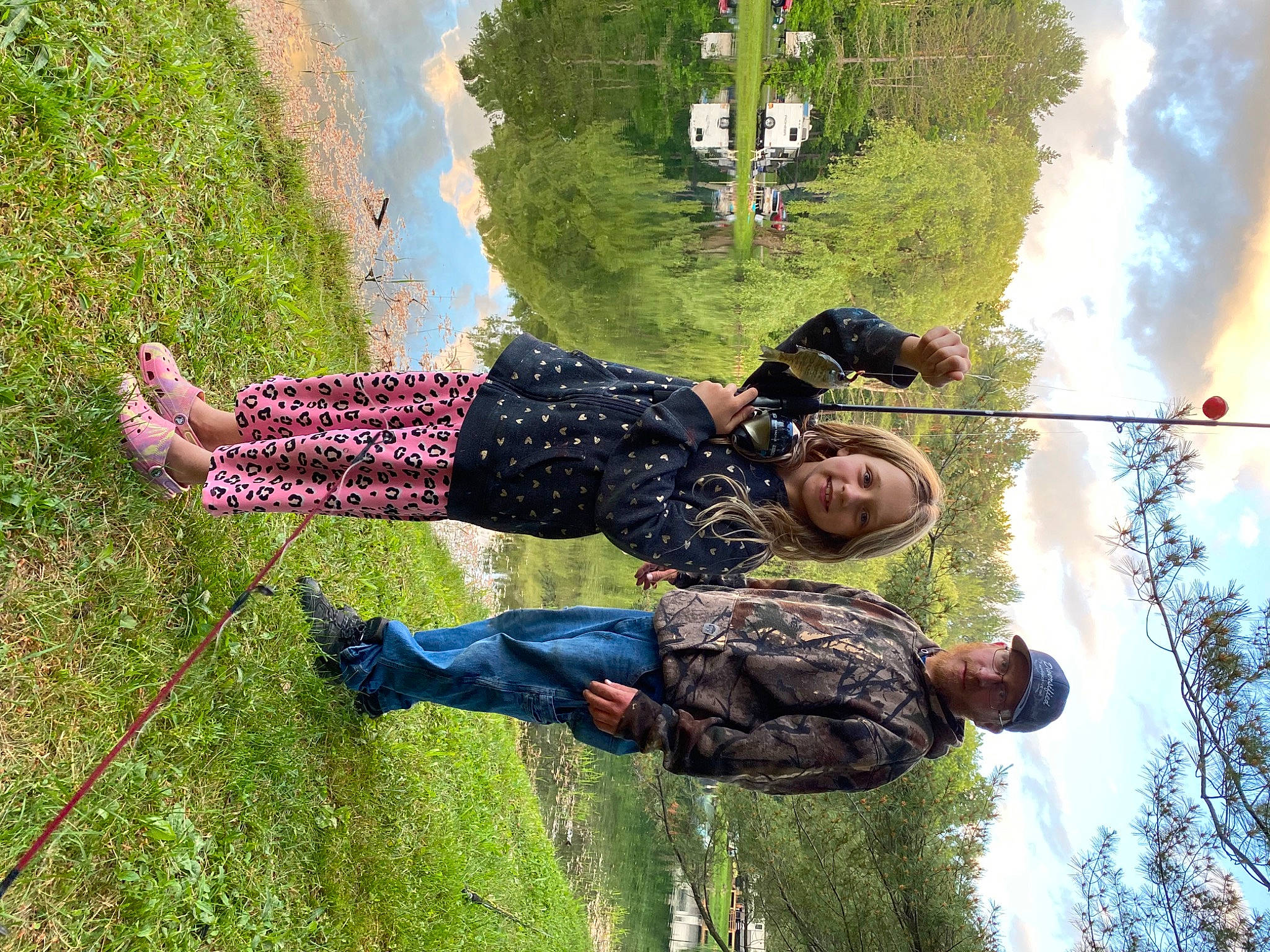 Amelia is registered to the contest to win money with this photo: adventure, cloud, fun, grass, grassland, green, happy, headwear, joy, landscape, leisure, luggage_and_bags, pattern, people_in_nature, person, photography, plant, recreation, sky, travel