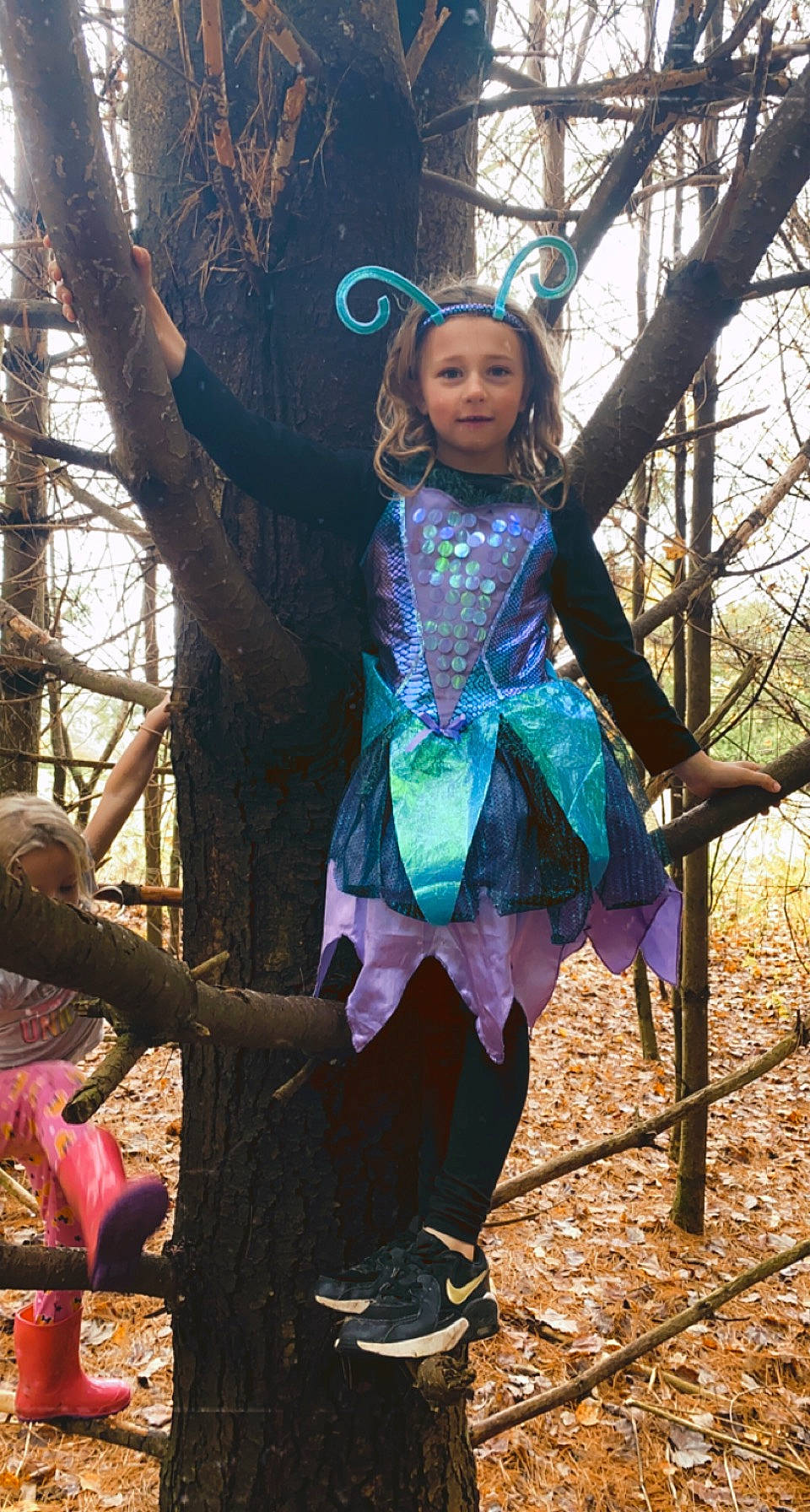 Amelia joined the competition — help win amazing prizes! child, costume, electric_blue, forest, fun, fur, grass, headwear, jungle, leisure, magenta, people_in_nature, person, recreation, sitting, toddler, tree, trunk, twig, winter