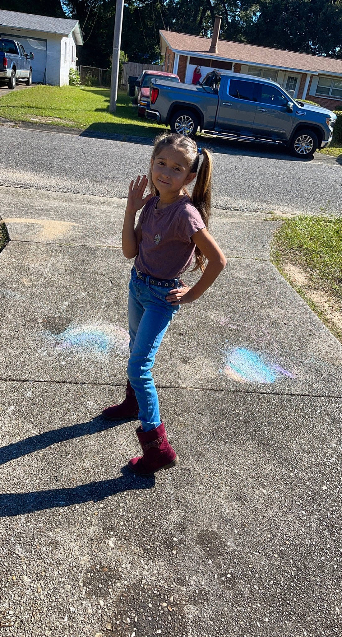 Lilyanna is registered to the contest to win money with this photo: asphalt, automotive_exterior, automotive_tire, bumper, car, denim, electric_blue, grass, jeans, joy, motor_vehicle, parking, person, plant, road, road_surface, sidewalk, thigh, tire, vehicle_door