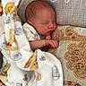 Colton joined the competition — help win amazing prizes! newborn, baby, blanket, winnie_the_pooh, sleeping, couch, pillow, decorative_pillow, patterned_cushion, infant, cozy, resting, child, indoors, soft_texture, cute, peaceful, wrapped, small_hand, face