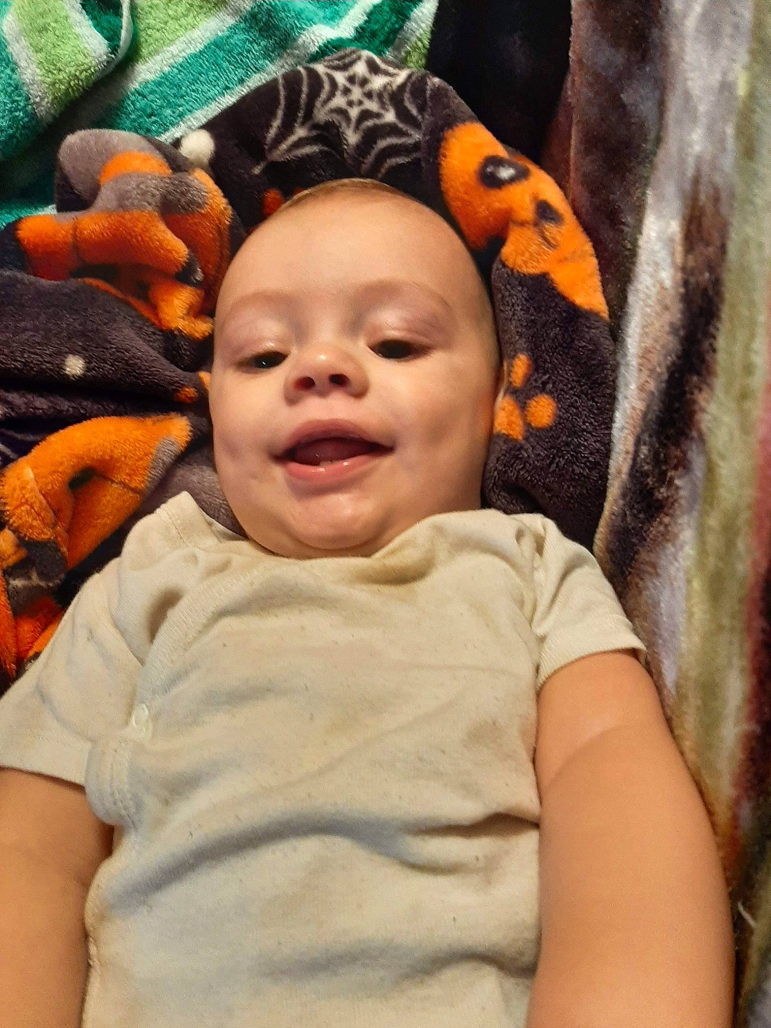 River joined the competition — help win amazing prizes! baby, baby_toddler_clothing, cheek, child, comfort, face, fun, happy, head, headgear, laugh, linens, lip, mouth, nose, orange, person, sleeve, smile, textile