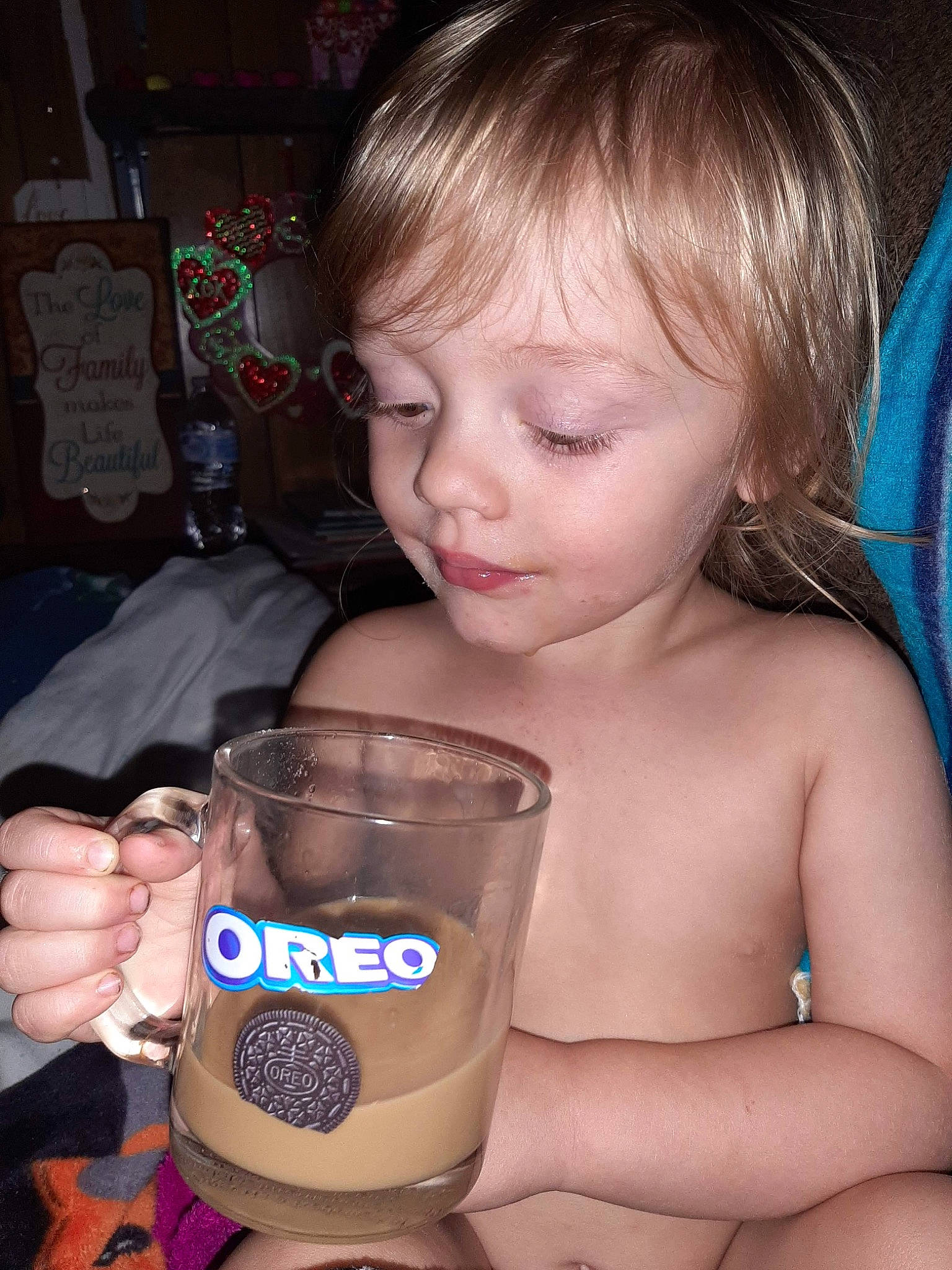 Blaze is registered to the contest to win money with this photo: baby, cheek, child, cool, cup, drink, drinking, drinkware, eyelash, facial_expression, finger, fun, hand, organ, people, person, product, serveware, skin, tableware