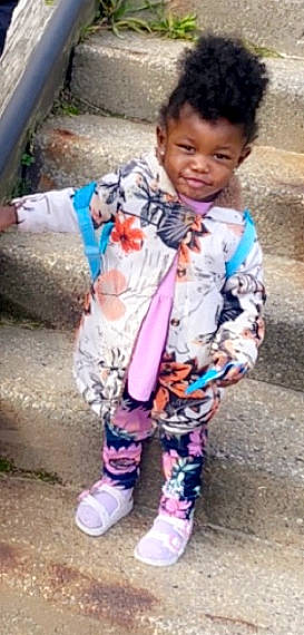 Alaiya joined the competition — help win amazing prizes! baby_toddler_clothing, cheek, child, cool, face, fun, happy, human_leg, mammal, outerwear, pattern, person, play, sitting, skin, sleeve, smile, sock, thigh, thumb