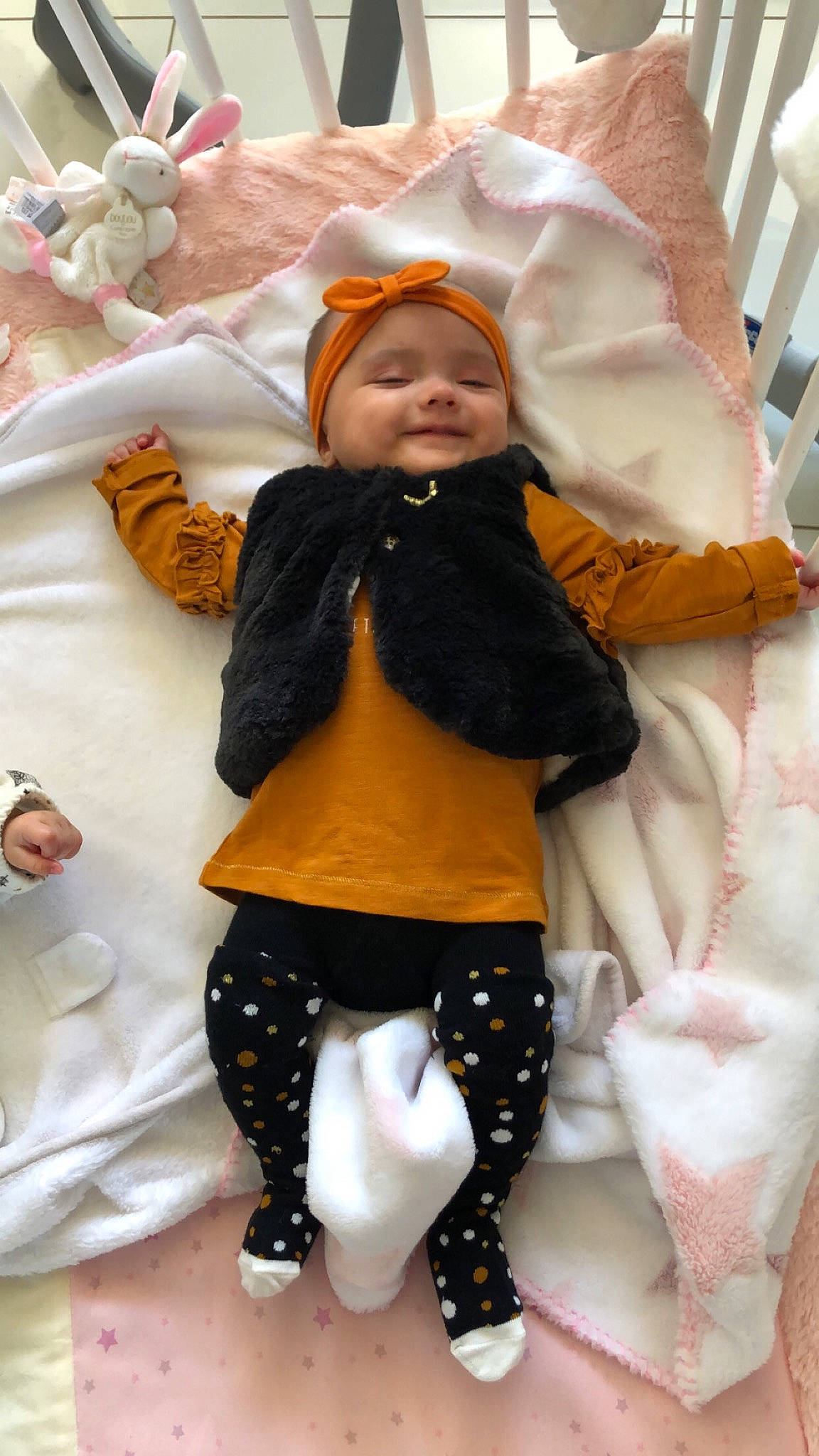 Nevennah participe au concours pour gagner de l'argent avec cette photo : baby, baby_toddler_clothing, cheek, child, comfort, doll, eye, happy, head, headwear, leg, outerwear, person, pink, skin, sleeve, smile, textile, thigh, toddler