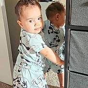 Matthew joined the competition — help win amazing prizes! toddler, child, mirror, reflection, carpet, pajamas, mickey_mouse, indoor, curly_hair, foot, standing, clothing, face, expression, furniture, storage_unit, wall, light, person, room