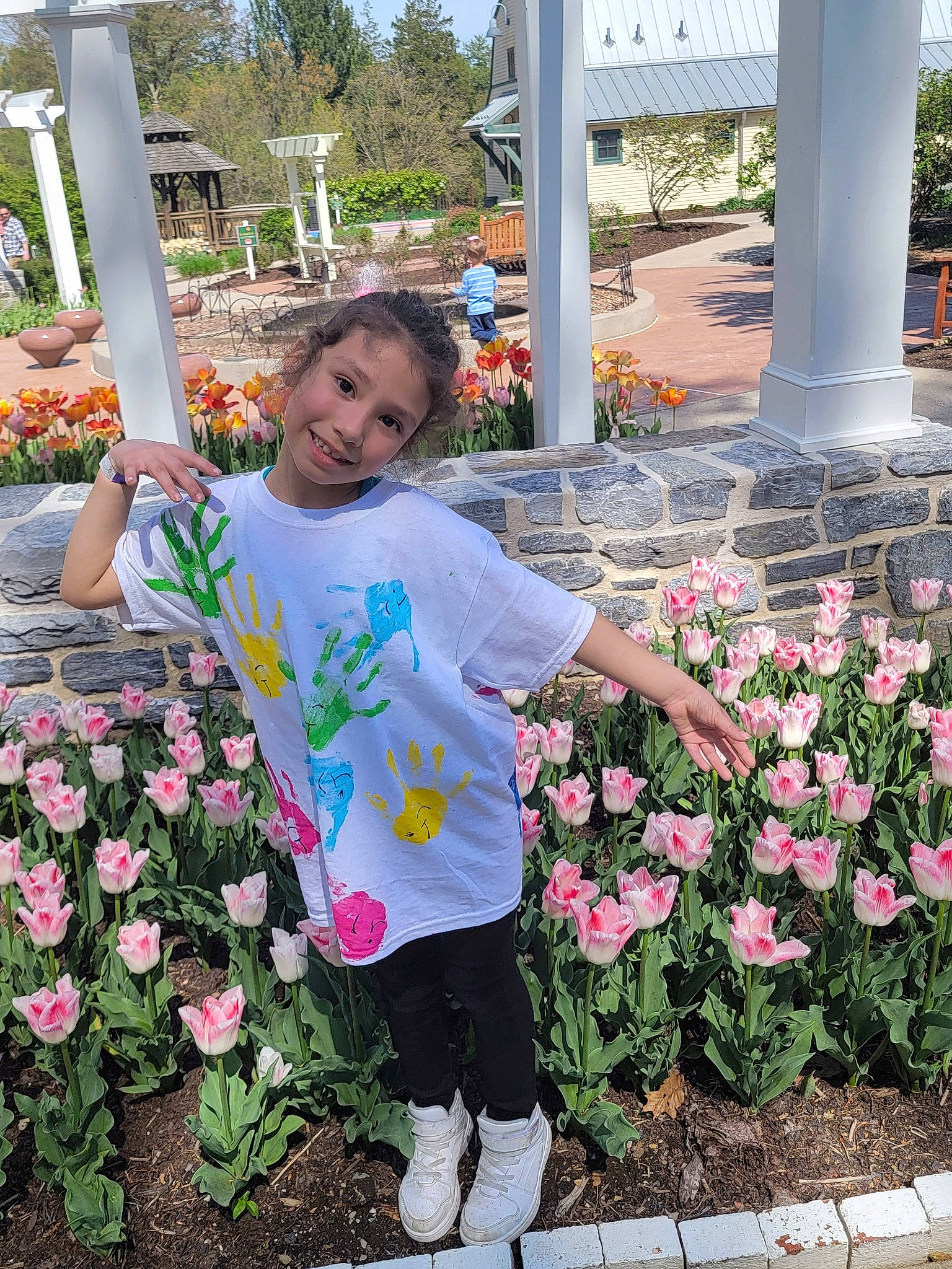 Josephine joined the competition — help win amazing prizes! annual_plant, beauty, botany, floral_design, floristry, flower, flowerpot, grass, green, happy, human_body, joy, leaf, leisure, person, petal, pink, plant, public_space, shorts