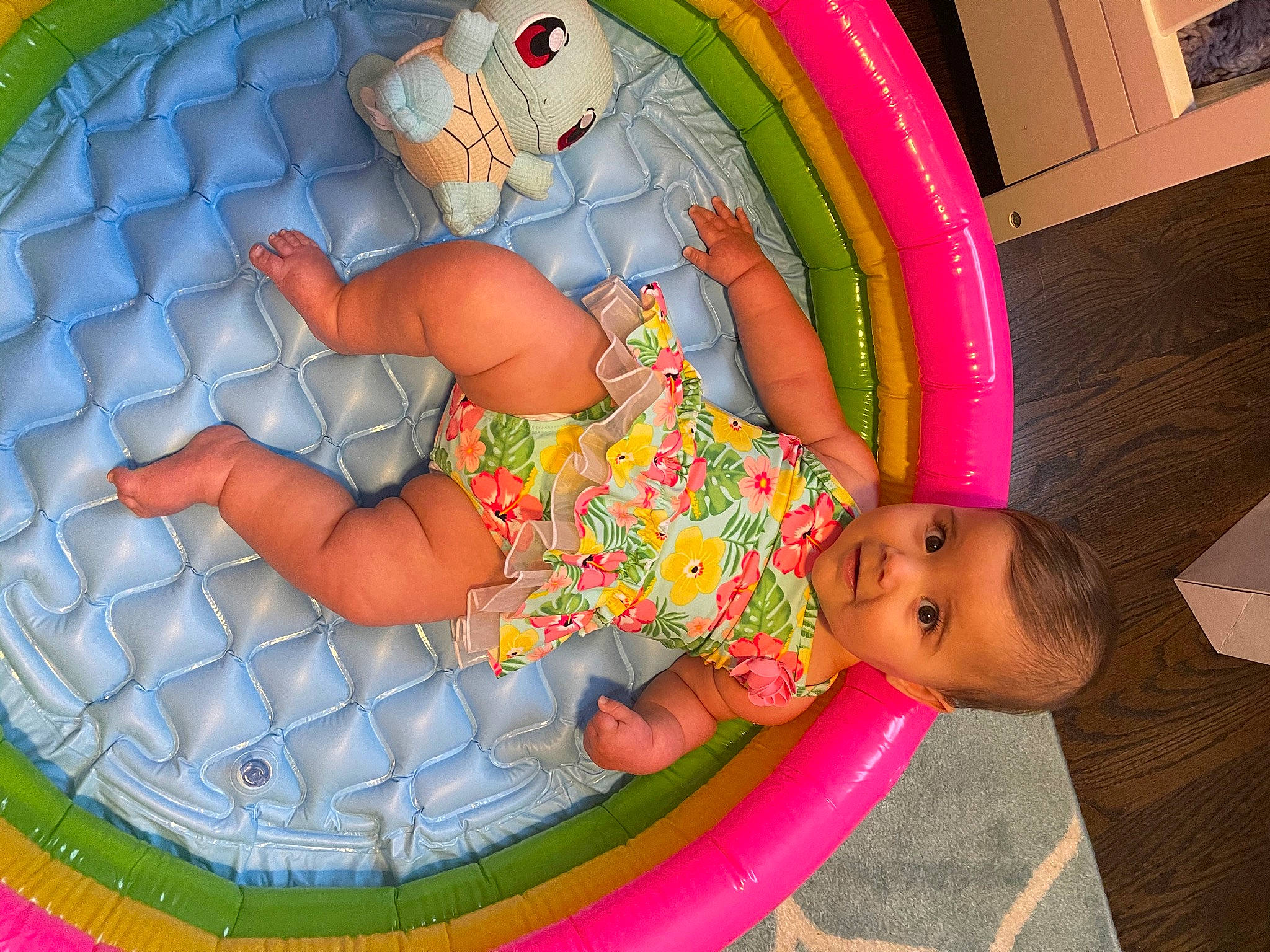 Phoebe is registered to the contest to win money with this photo: baby, baby_products, baby_toddler_clothing, baby_toys, bathing, child, circle, comfort, fun, inflatable, leisure, magenta, organ, pattern, person, pink, play, product, recreation, thigh