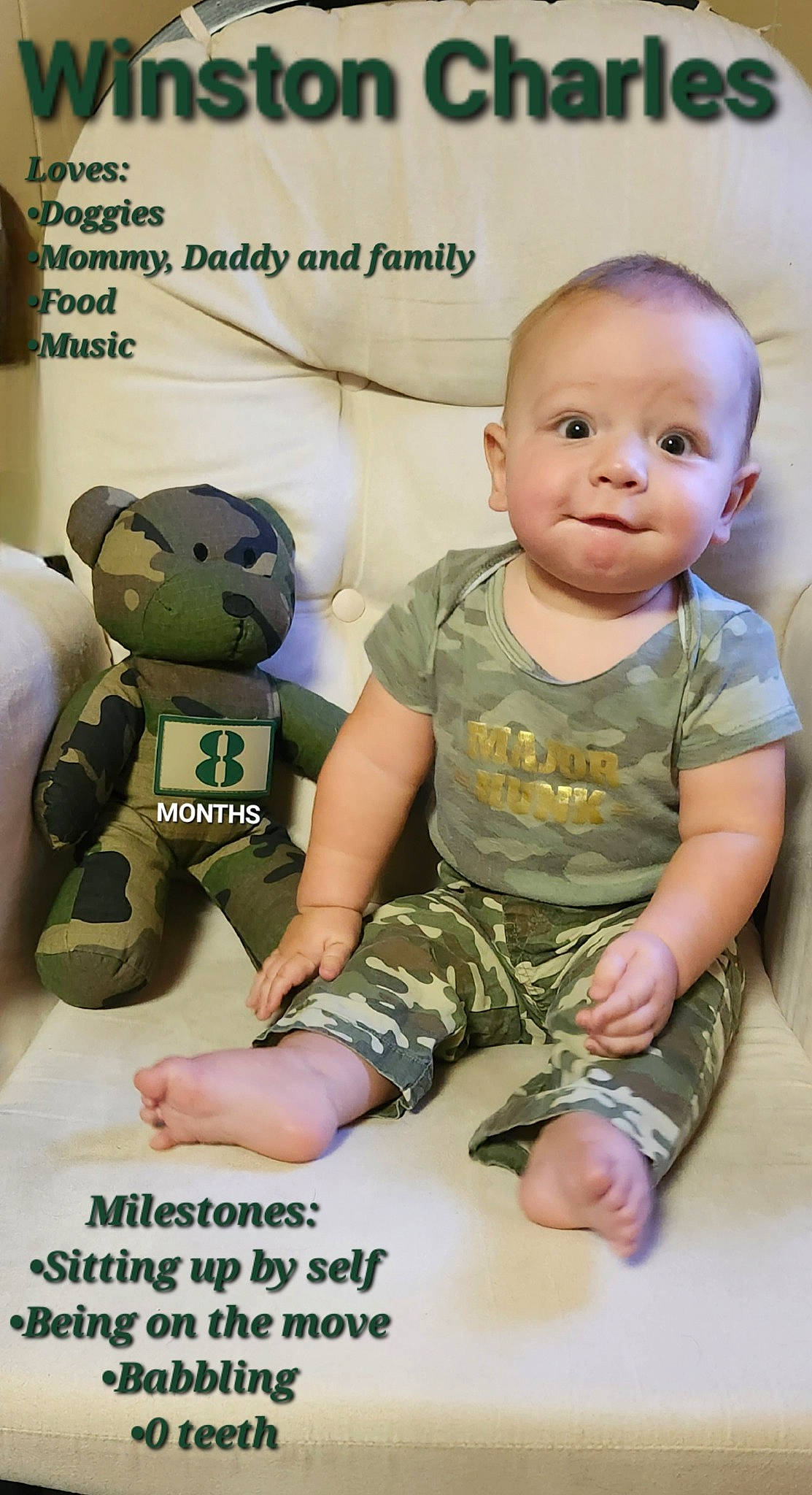 Winston is registered to the contest to win money with this photo: baby, baby_toddler_clothing, child, facial_expression, font, happy, military_camouflage, pattern, person, photo_caption, play, product, room, sitting, sleeve, smile, stuffed_toy, t_shirt, thumb, toddler