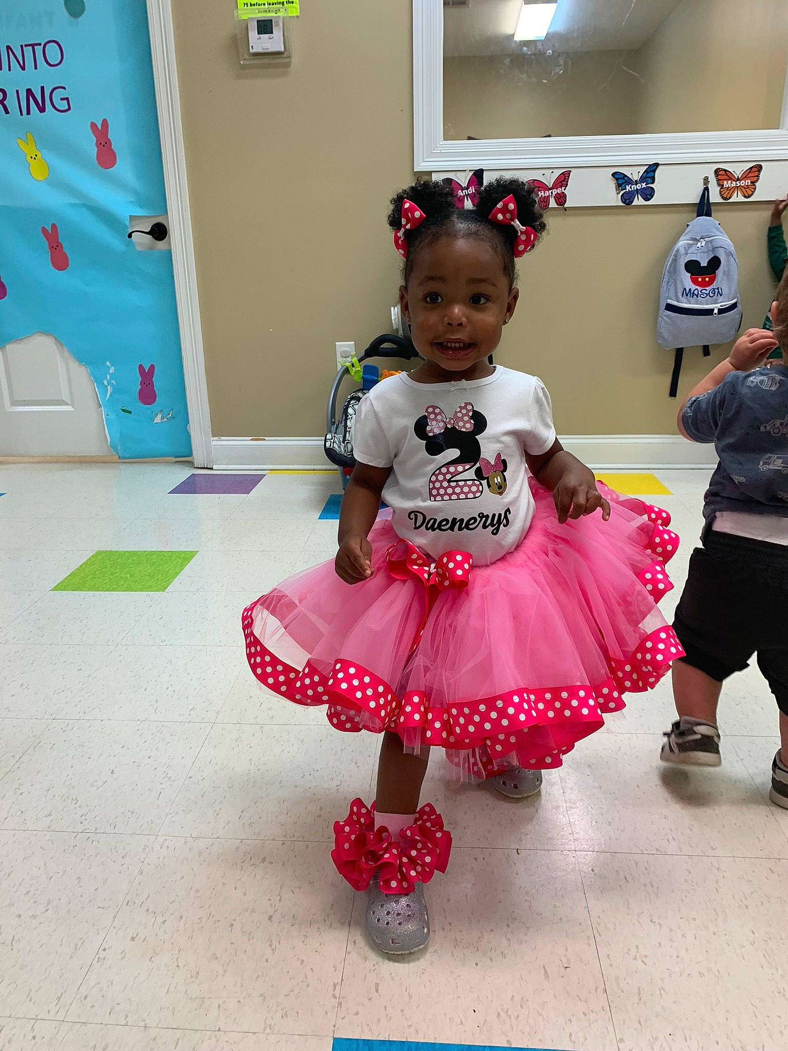 Daenerys joined the competition — help win amazing prizes! baby_toddler_clothing, bag, child, costume, door, event, flooring, footwear, fun, happy, leisure, luggage_and_bags, magenta, pattern, person, pink, play, recreation, room, shorts