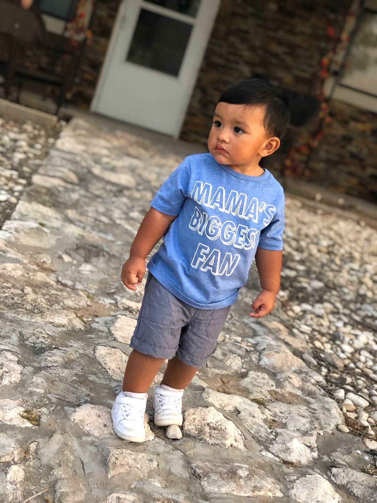 Adan joined the competition — help win amazing prizes! blue, child, cobblestone, cool, denim, flooring, footwear, jeans, person, play, shoe, sleeve, smile, t_shirt, toddler, vacation