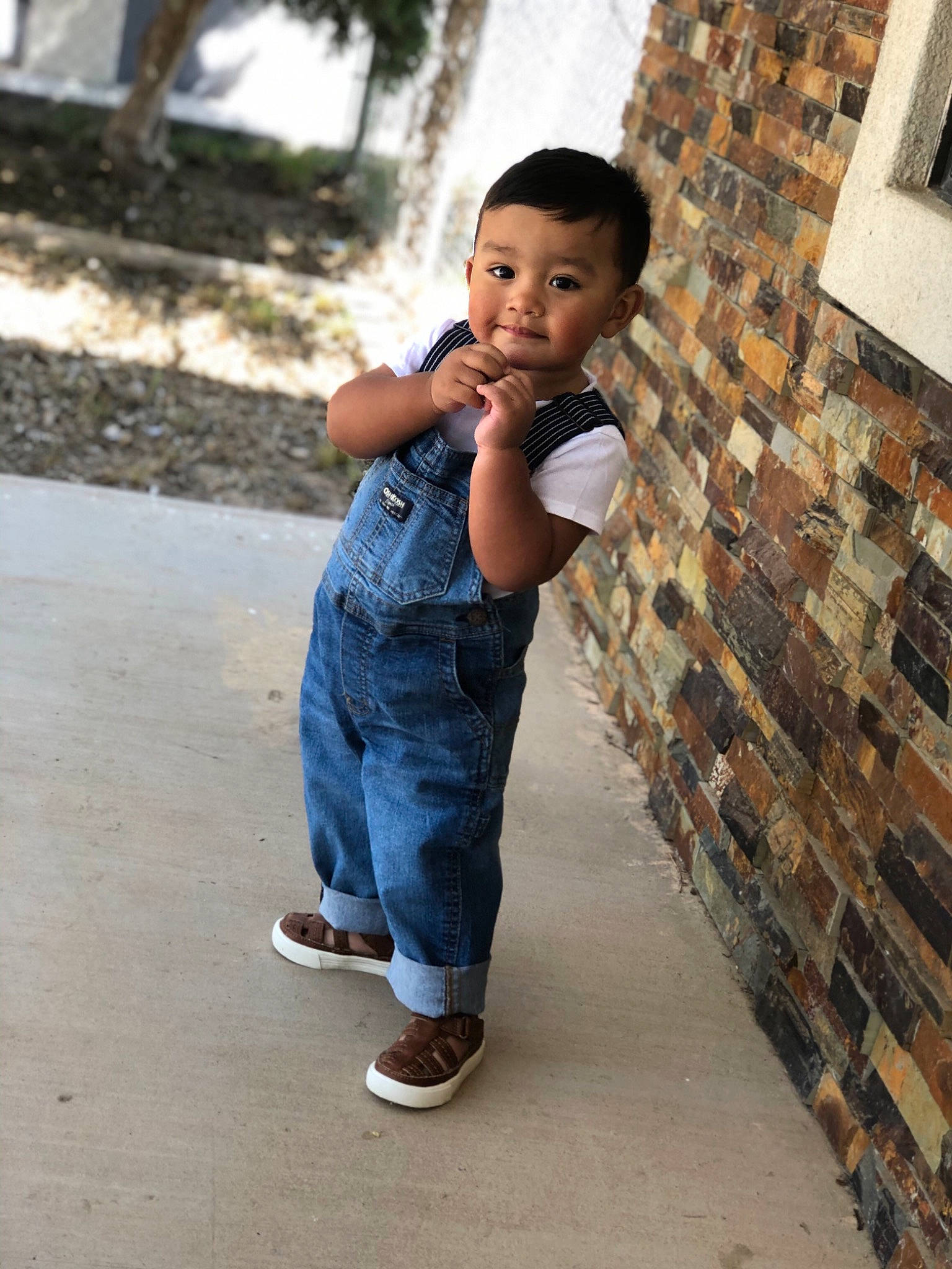 Adan is registered to the contest to win money with this photo: child, denim, jeans, person, shoe, standing, toddler