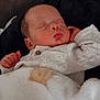 Rodney is registered to the contest to win money with this photo: baby, newborn, sleeping, blanket, infant, cute, peaceful, soft, clothing, face, hand, rest, comfort, portrait, child, young, indoors, warm, cozy, relaxation