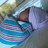 newborn, baby, blanket, hospital, bed, resting, wrapped, sleeping, indoors, soft_light, peaceful, infant, child, person, portrait, hospital_room, quiet, tender, cozy, wrapped_in_blanket
