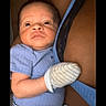 arm, baby, blue_clothing, bonding, care, child, close_up, cute, expression, family, holding, indoor, infant, mittens, newborn, person, portrait, skin, striped_pants, young_child
