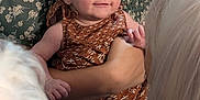 Cordelia joined the competition — help win amazing prizes! baby, child, smile, person, adult, holding, clothing, patterned, floral, green, brown, hair, white_hair, face, portrait, happy, interaction, indoor, family, love