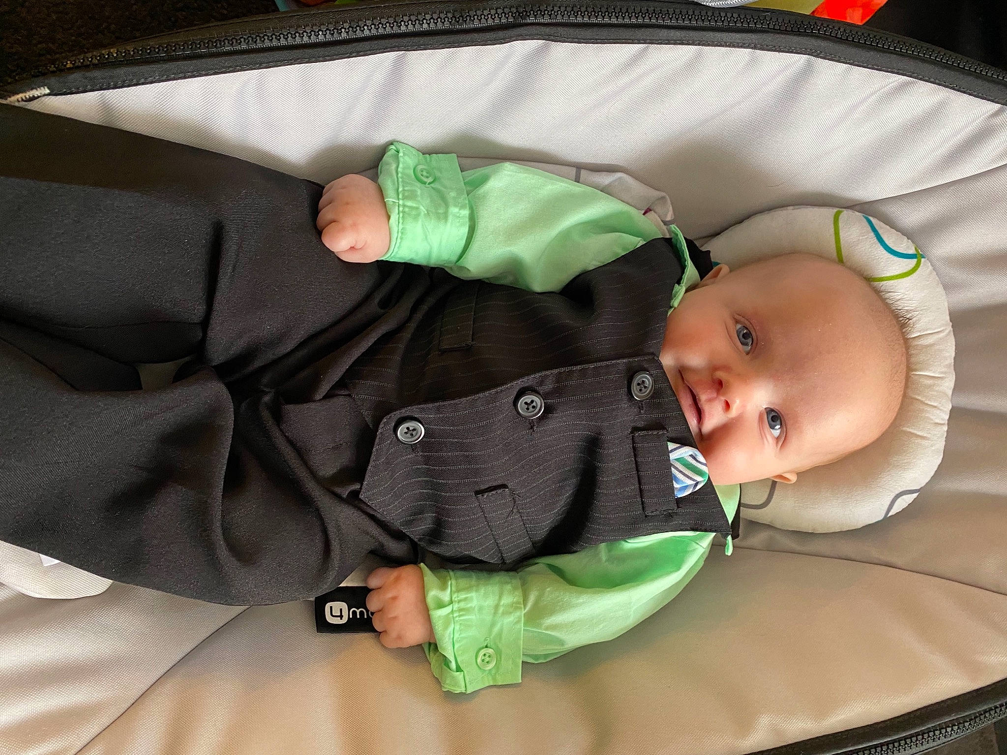 Jimmy joined the competition — help win amazing prizes! baby, baby_carriage, baby_products, baby_safety, baby_toddler_clothing, car_seat, child, collar, comfort, fashion_accessory, green, hand, lap, pattern, person, sitting, sleeve, tie, toddler, watch