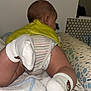 baby, baby_foot, baby_leg, back, bear_design, changing_pad, child, cute, diaper, head, indoor, infant, patterned_surface, skin, socks, striped_clothing, toddler, towel, white_socks, yellow_clothing