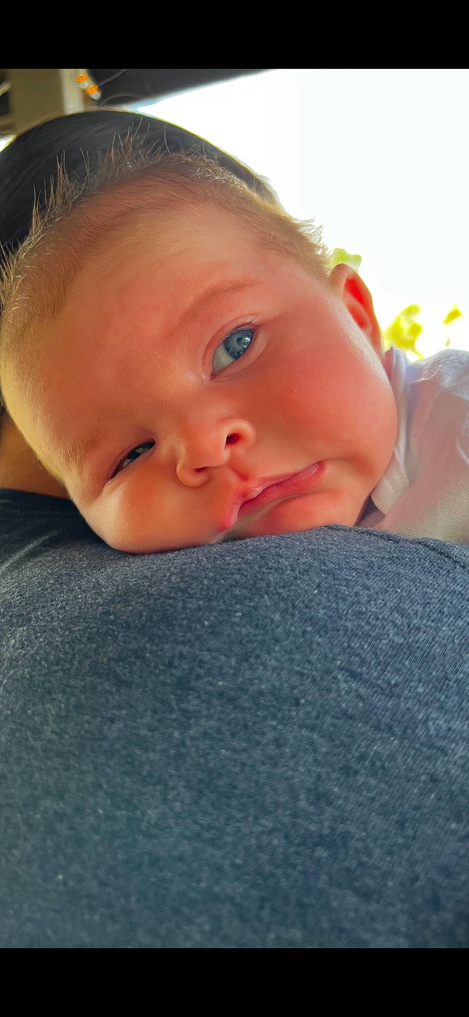 Delylah is registered to the contest to win money with this photo: baby, baby_toddler_clothing, cheek, comfort, eyebrow, eyelash, fun, grass, hairstyle, happy, human_body, iris, lip, mouth, neck, nose, person, skin, sky, smile