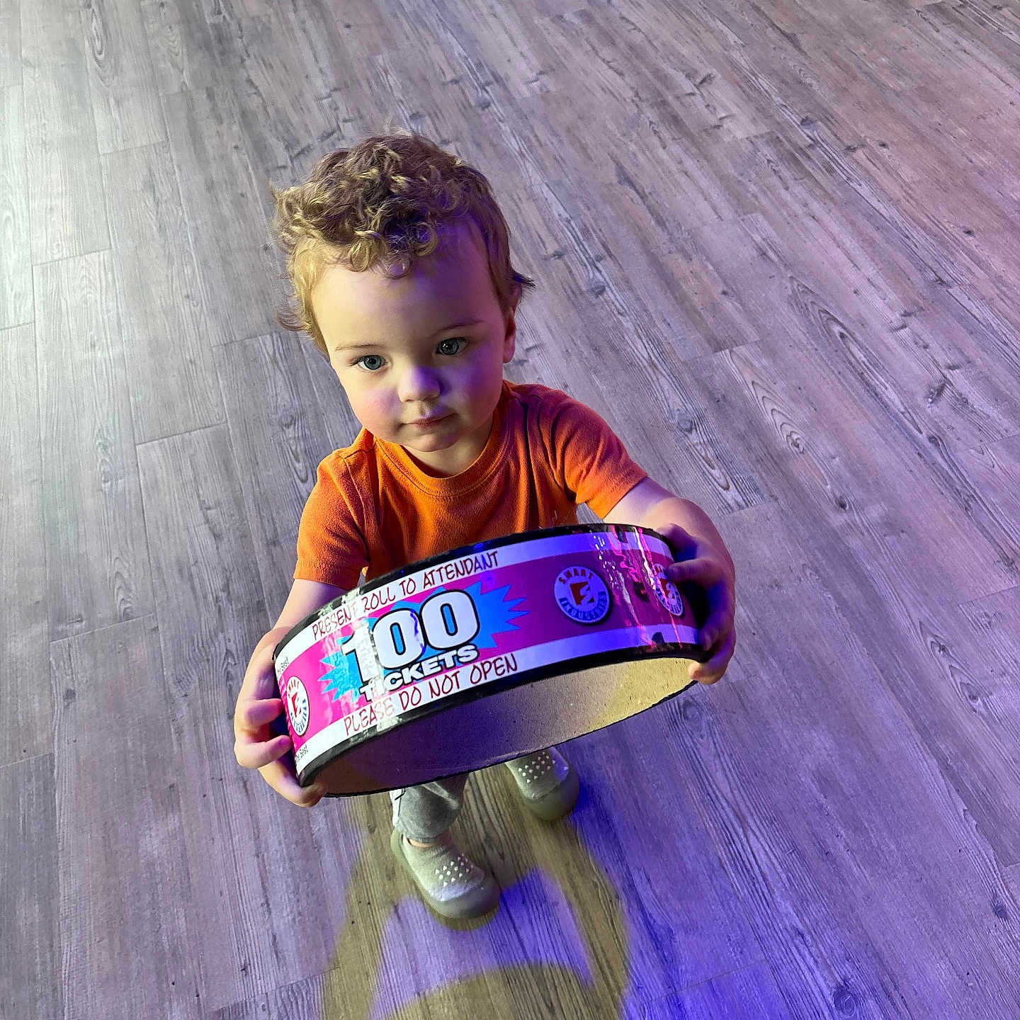 Max is registered to the contest to win money with this photo: bodypart, boy, child, clothing, drum, face, finger, footwear, hand, hardwood, head, male, musicalinstrument, percussion, person, photography, portrait, purple, shoe, wood