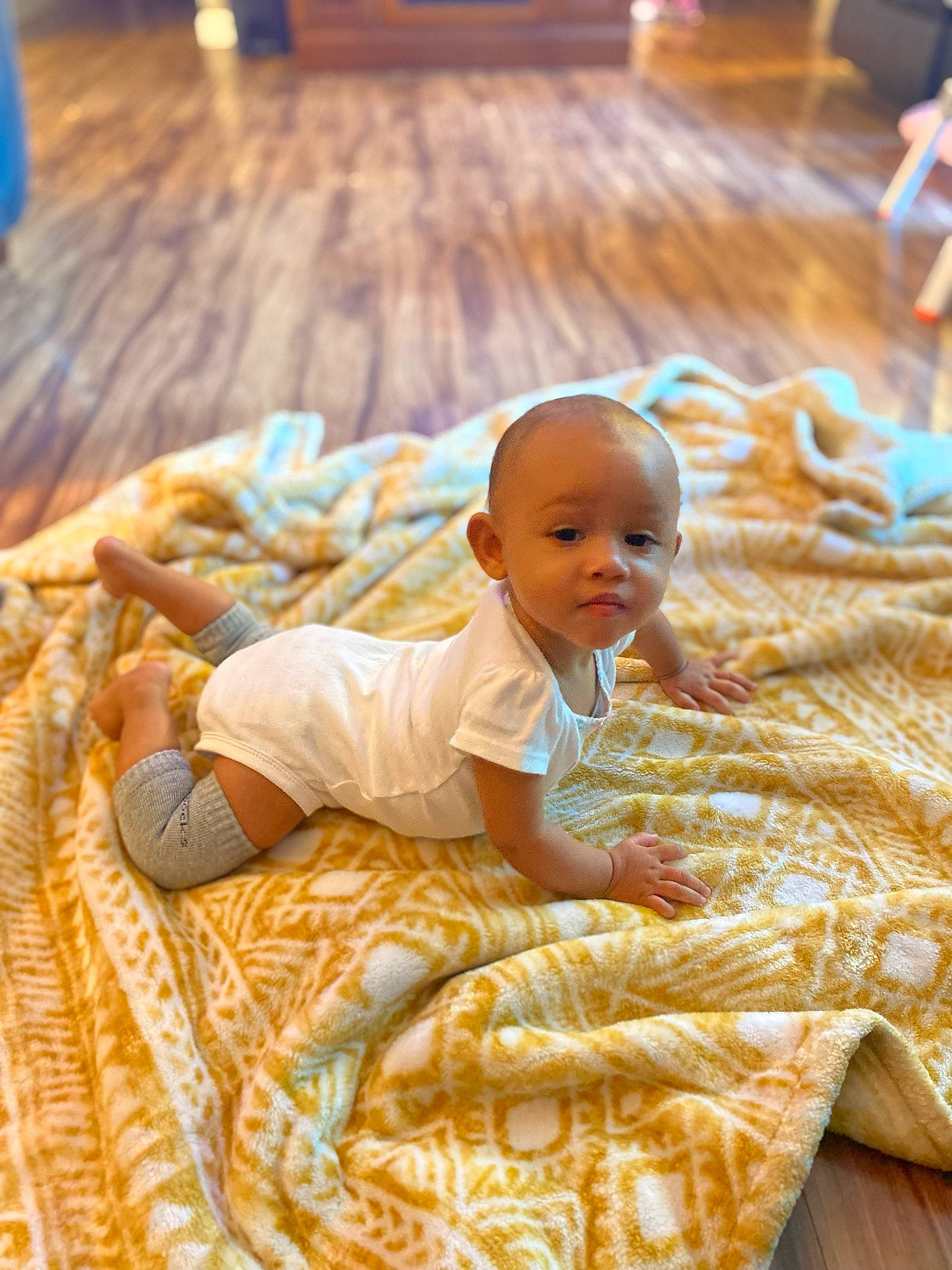 Kassidy is registered to the contest to win money with this photo: baby, baby_toddler_clothing, chair, cheek, child, comfort, event, face, flooring, fun, happy, hardwood, leisure, linens, person, sitting, skin, smile, toddler, wood