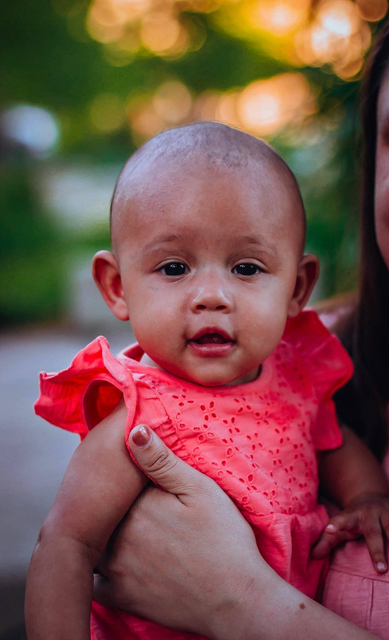 Kassidy is registered to the contest to win money with this photo: baby, baby_toddler_clothing, cheek, child, dress, finger, flash_photography, fun, gesture, grass, hairstyle, hand, happy, iris, lip, nose, person, pink, skin, smile