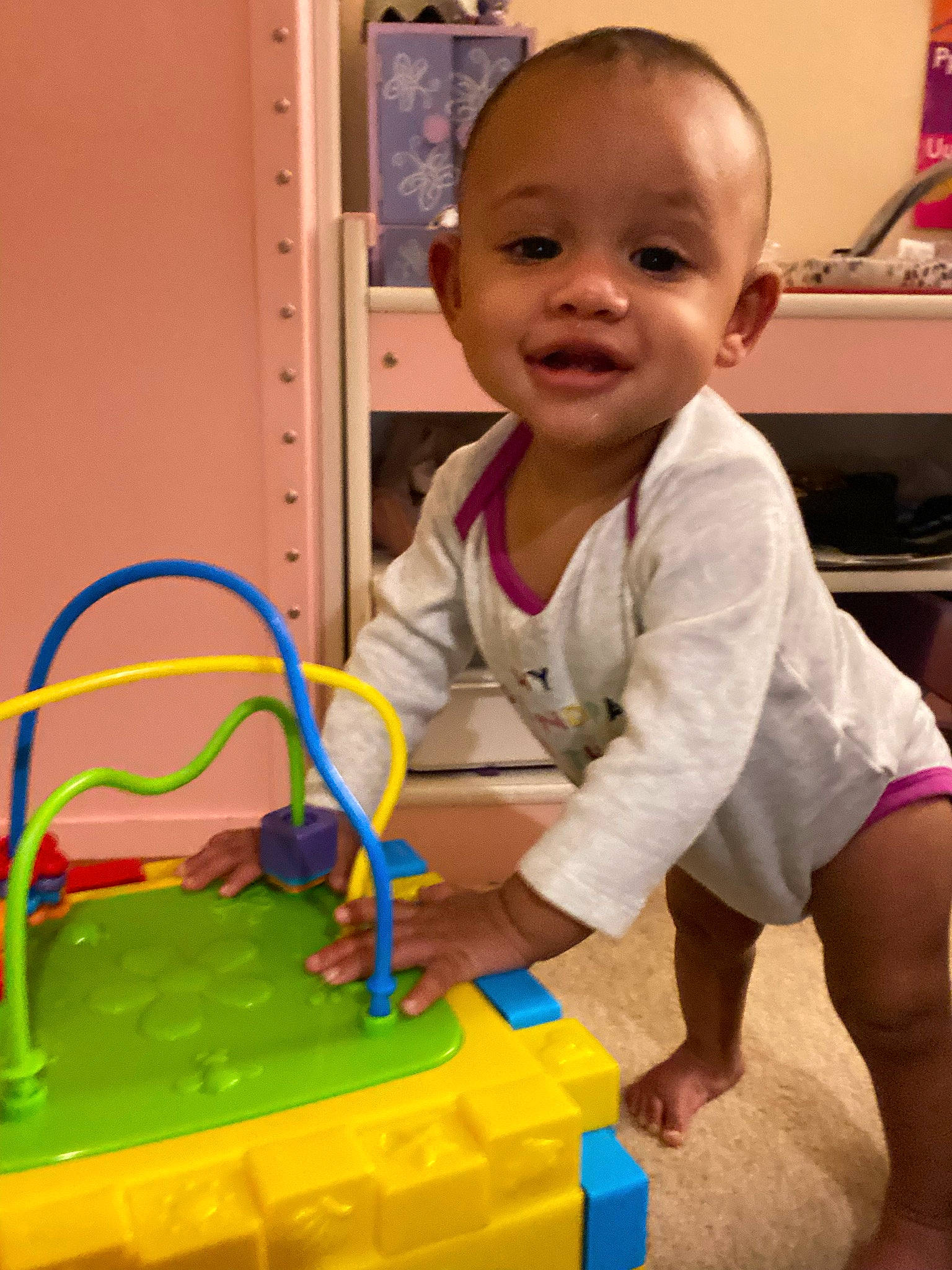 Kassidy is registered to the contest to win money with this photo: baby, baby_toddler_clothing, child, door, educational_toy, electric_blue, engineering, flooring, fun, interlocking_block, lego, person, plastic, play, room, smile, t_shirt, toddler, toy, toy_block
