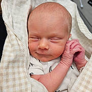 Elizabeth joined the competition — help win amazing prizes! newborn, baby, sleeping, blanket, swaddled, infant, hand, face, skin, cute, peaceful, soft, closeup, portrait, indoors, comfort, rest, clothing, newborn_clothes, gentle
