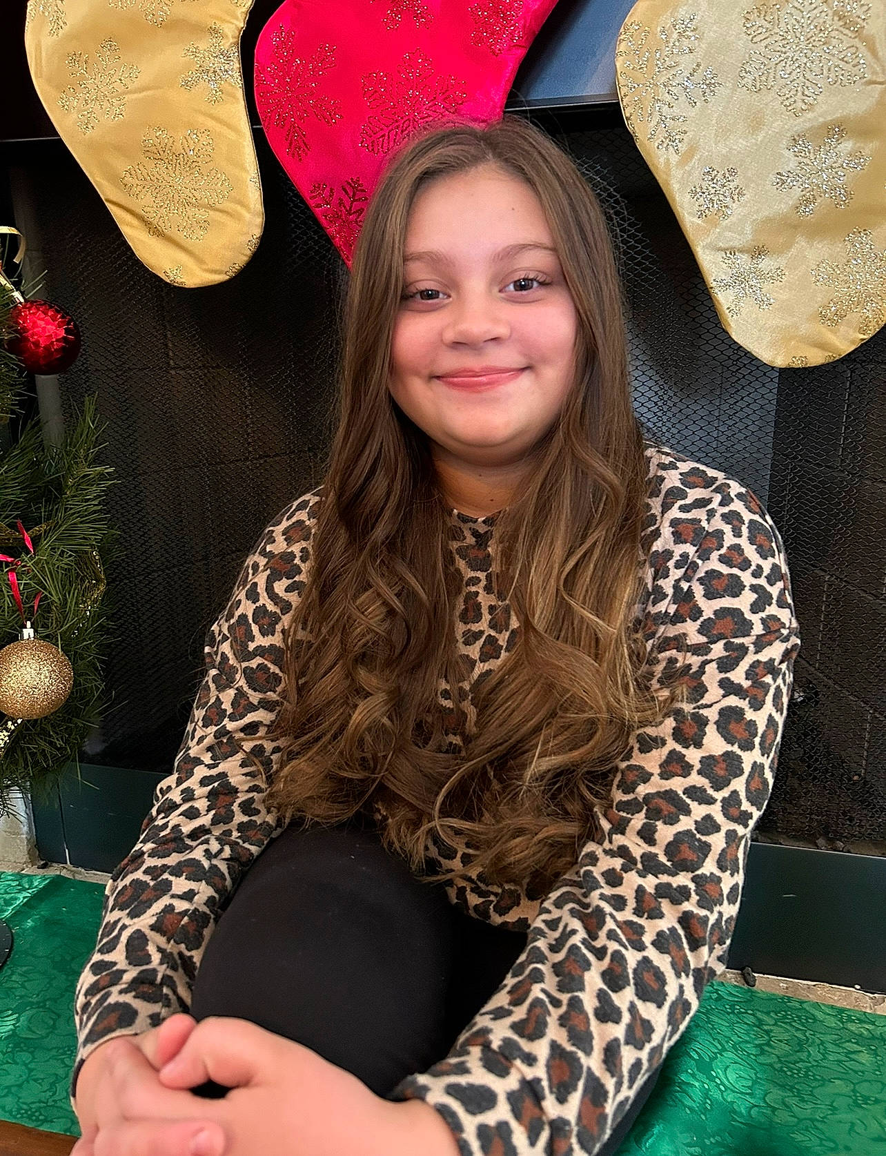 Sophia is registered to the contest to win money with this photo: black, event, face, fashion_accessory, fashion_design, fun, fur, hair, happy, head, jewellery, joy, magenta, neck, necklace, pattern, peach, person, sitting, smile