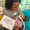 Delilah joined the competition — help win amazing prizes! mother, baby, child, hospital, medical_tubes, holding_sign, happy_mothers_day, love, affection, curly_hair, purple_clothing, indoor, care, parent_child, healthcare, woman, seated, toddler, badge, portrait