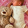Kinsley joined the competition — help win amazing prizes! baby, sleeping, teddy_bear, plush_toy, blanket, pink, flower_pattern, onesie, infant, cute, soft, child, resting, peaceful, cozy, indoors, portrait, newborn, toy, comfort