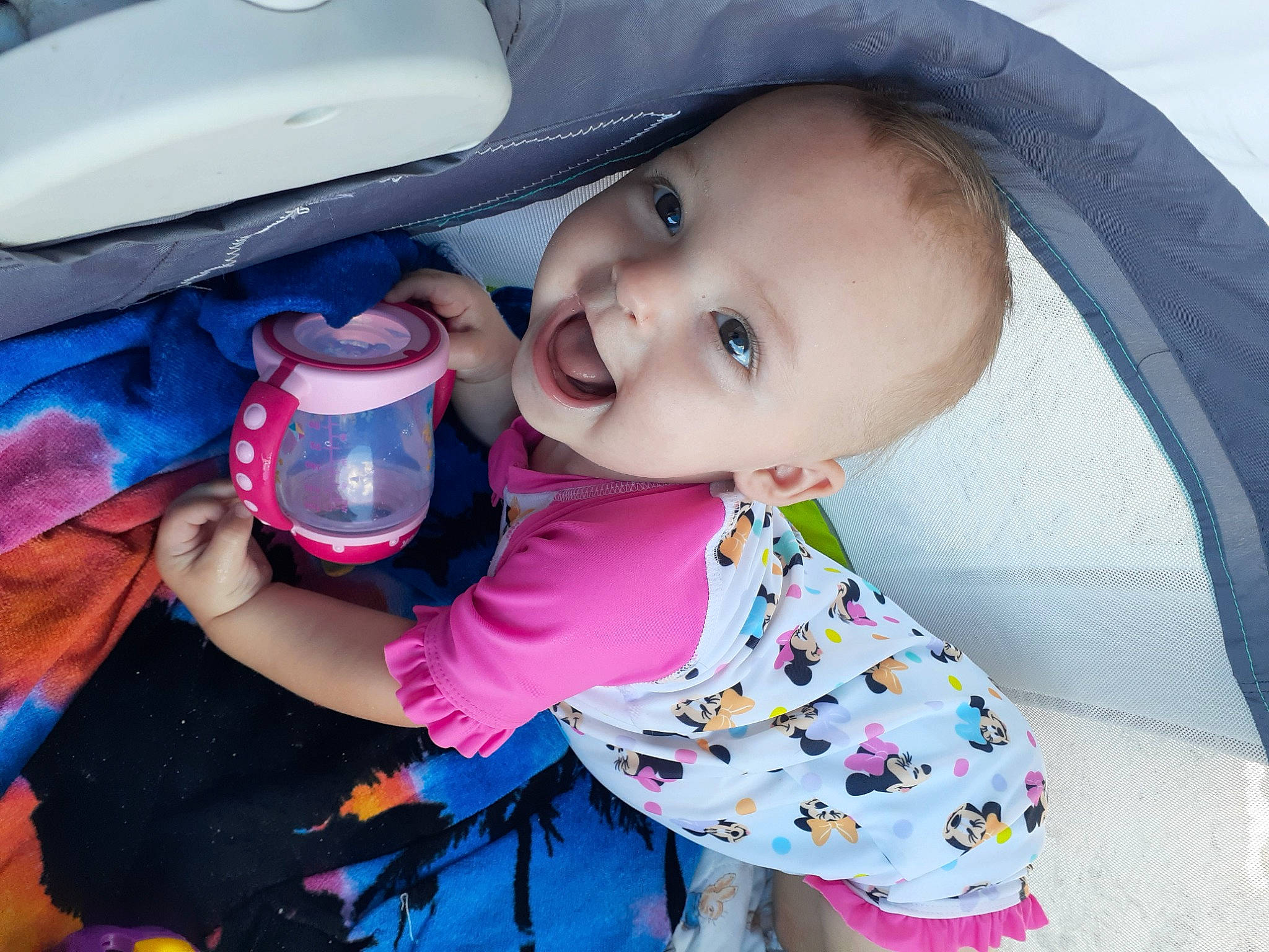 Gracie is registered to the contest to win money with this photo: baby, baby_products, baby_toddler_clothing, cheek, child, cool, drinkware, eyelash, fun, hairstyle, happy, hat, headgear, human, mouth, person, pink, skin, sleeve, smile