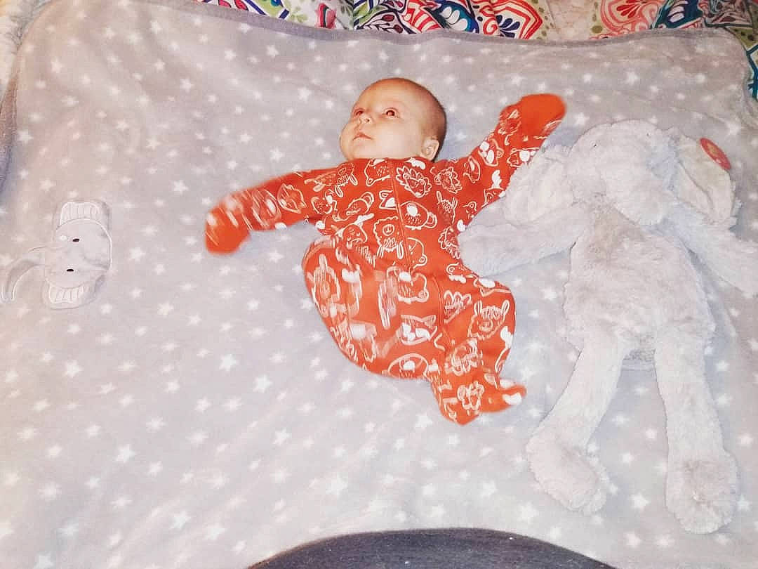 Gracie is registered to the contest to win money with this photo: baby, baby_products, baby_toddler_clothing, baby_toys, carmine, child, comfort, fun, happy, head, linens, pattern, person, room, sleeve, toddler