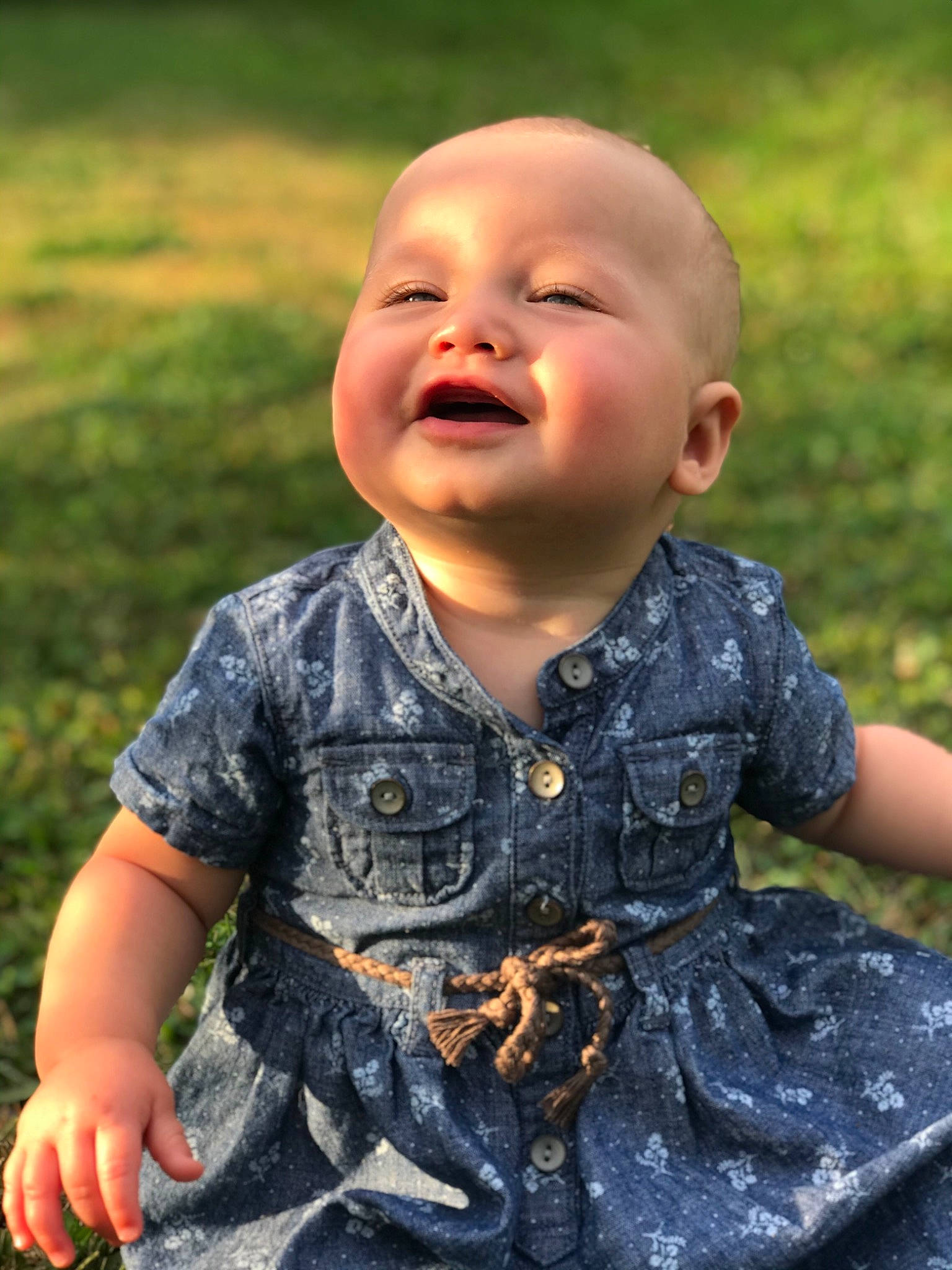 Leona joined the competition — help win amazing prizes! baby, cheek, child, facial_expression, finger, fun, grass, happy, head, person, photography, portrait_photography, sitting, skin, smile, toddler