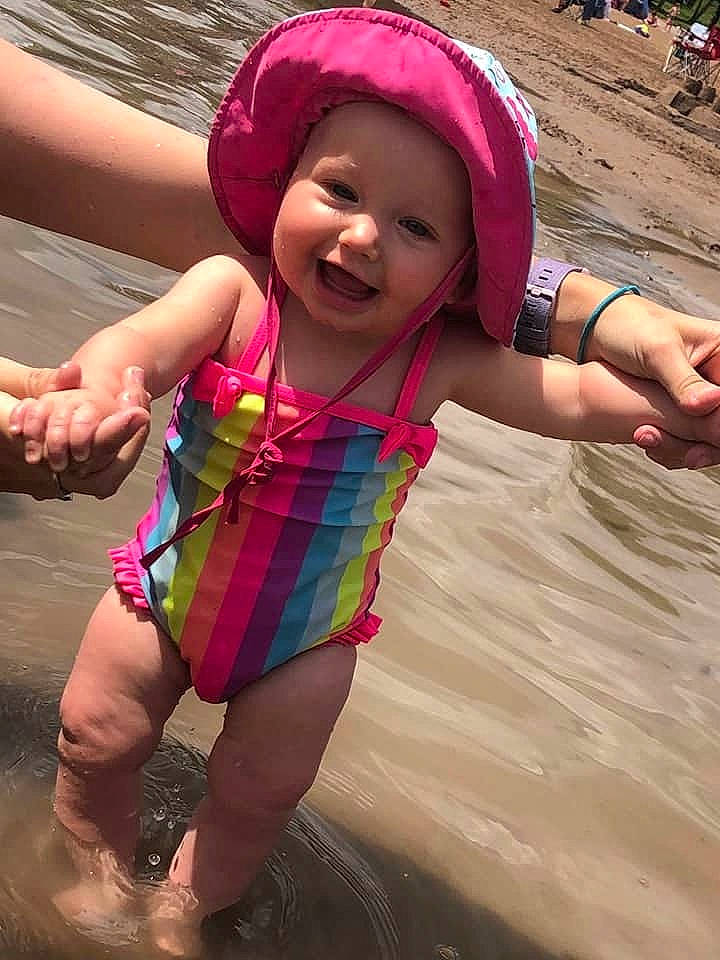 Leona joined the competition — help win amazing prizes! child, fun, happy, headgear, headwear, person, pink, play, smile, summer, sun_hat, swimwear, toddler, vacation