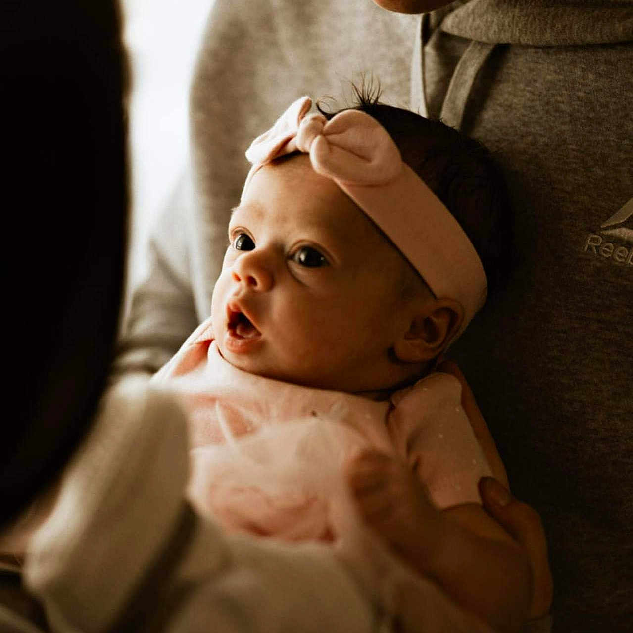 Leanne joined the competition — help win amazing prizes! accessories, baby, bonnet, clothing, couch, earring, face, furniture, hat, head, jewelry, kissing, necklace, newborn, people, person, photography, portrait, ring, t_shirt
