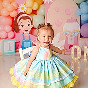 Makenna is registered to the contest to win money with this photo: toddler, child, dress, birthday, balloons, colorful, pastel, smiling, happy, party, decorations, one_year_old, cute, indoor, celebration, barefoot, girl, toy_blocks, gumball_machine, photo_shoot