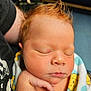 newborn, baby, sleeping, infant, red_hair, hand, blanket, face, peaceful, closeup, skin, portrait, child, resting, cute, soft_light, wrapped, indoors, toddler, newborn_baby