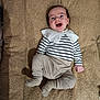 Gulia participe au concours pour gagner de l'argent avec cette photo : baby, infant, smiling, striped_shirt, ruffled_collar, lying_down, beige_blanket, carpet, socks, pants, portrait, happy, cute, face, blue_eyes, hand, foot, home_interior, soft_texture, cozy