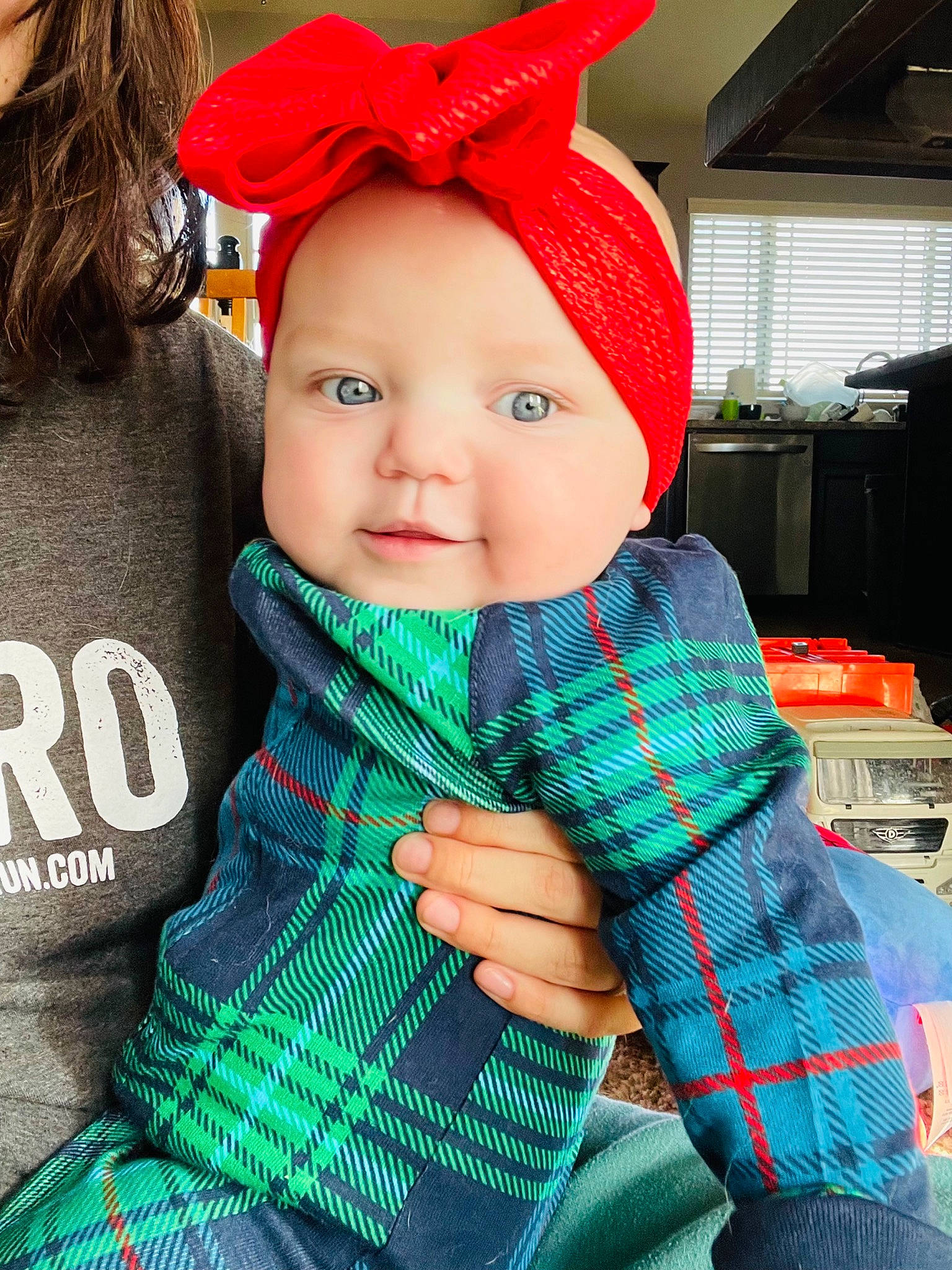 Frankie is registered to the contest to win money with this photo: baby, baby_toddler_clothing, beanie, cap, child, cool, costume_hat, electric_blue, fashion_accessory, happy, headwear, knit_cap, pattern, person, personal_protective_equipment, plaid, sleeve, smile, tartan, textile