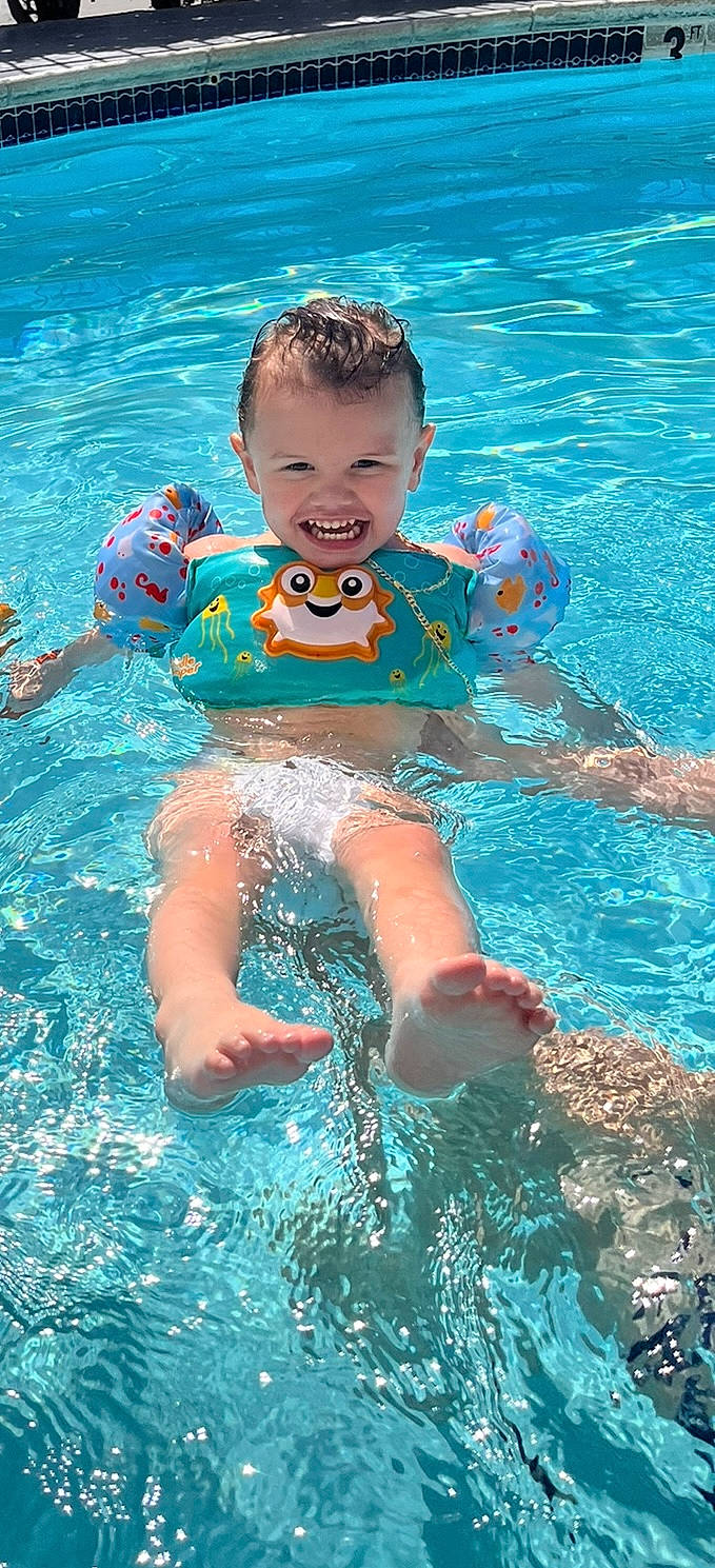 Lenny joined the competition — help win amazing prizes! aqua, azure, bathing, blue, body_of_water, eye, face, fun, happy, head, leisure, muscle, outdoor_recreation, person, recreation, red, smile, summer, swimming_pool, toddler