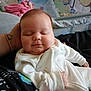 Sophia joined the competition — help win amazing prizes! baby, infant, sleeping, onesie, person, hand, blanket, crib, bedroom, soft_toys, pajamas, closeup, indoor, comfort, cute, peaceful, resting, child, parent, family