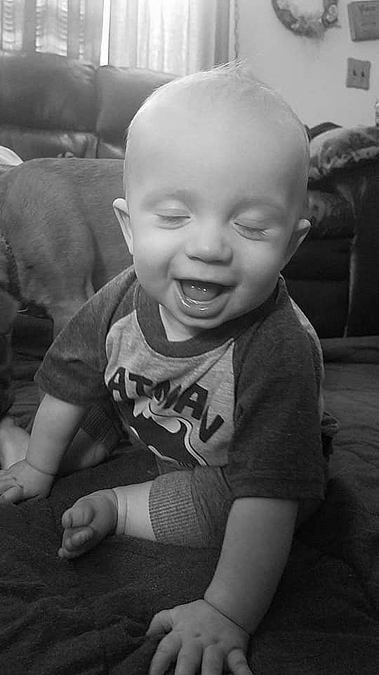 Ivar is registered to the contest to win money with this photo: baby, black, black_and_white, cheek, child, chin, eye, face, facial_expression, forehead, fun, head, lip, monochrome, monochrome_photography, people, person, skin, smile, toddler