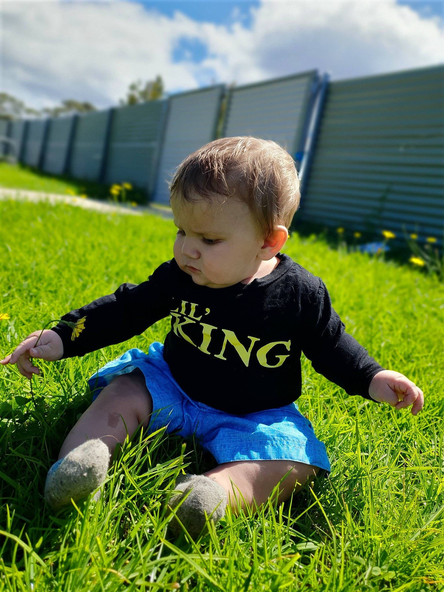 Tyrese joined the competition — help win amazing prizes! baby, blue, child, fun, grass, grass_family, grassland, green, happy, lawn, meadow, people_in_nature, person, plant, play, sitting, sky, spring, summer, toddler