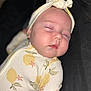 Ember joined the competition — help win amazing prizes! baby, sleeping, infant, headband, onesie, lemon_pattern, face, peaceful, closeup, soft_skin, child, cozy, cute, portrait, resting, young_child, apparel, headwear, indoors, calm