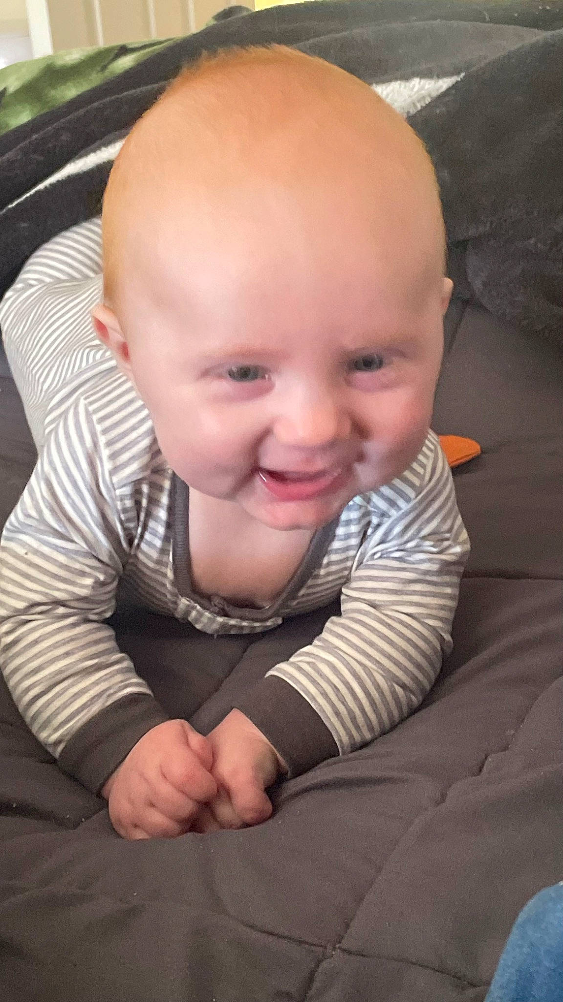 Zadrian is registered to the contest to win money with this photo: baby, baby_toddler_clothing, cheek, child, chin, comfort, eye, finger, flash_photography, flooring, fun, grass, happy, iris, joy, mouth, nose, person, skin, sleeve