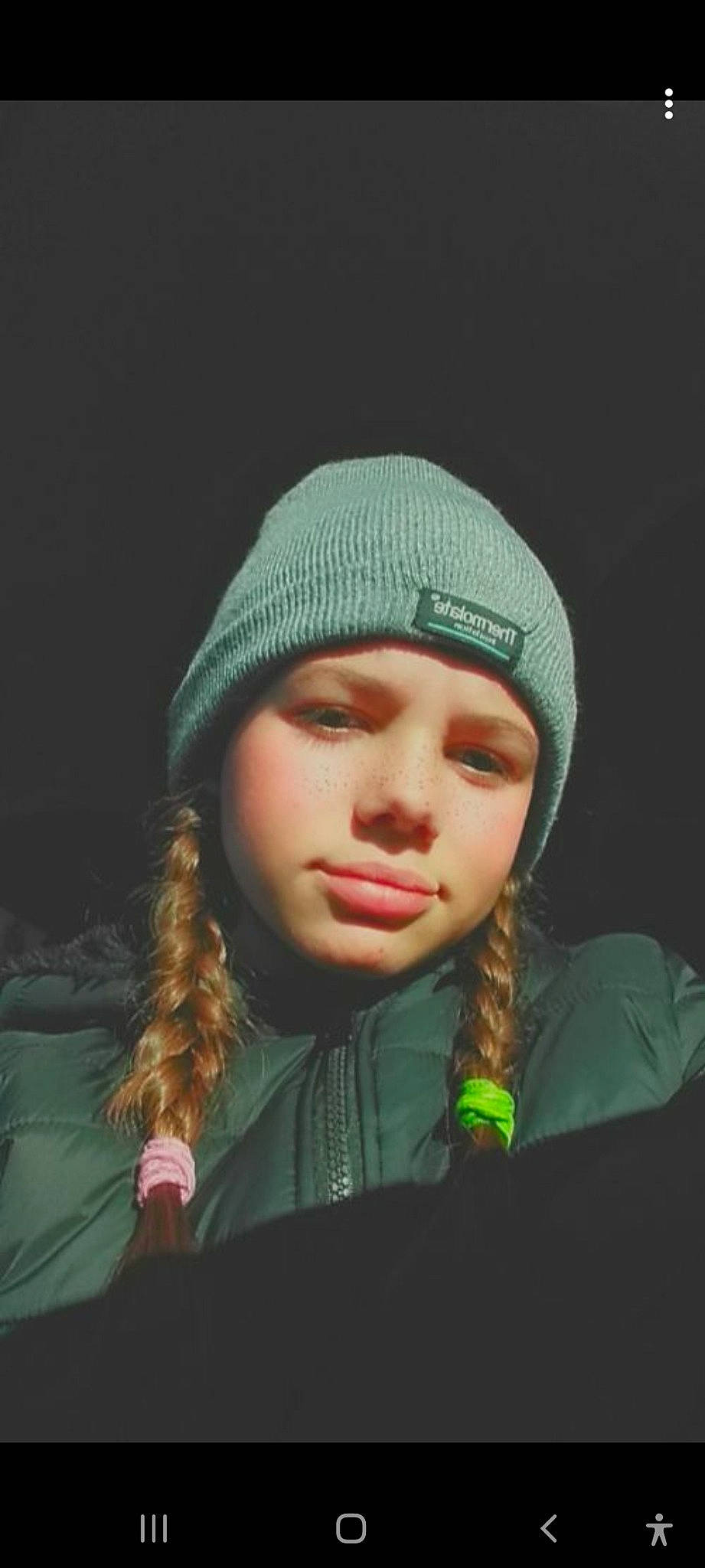 Emiliana participe au concours pour gagner de l'argent avec cette photo : beanie, brown_hair, cap, cheek, darkness, eyelash, fashion_accessory, flash_photography, happy, hat, headgear, headwear, hood, knit_cap, lip, neck, nose, person, street_fashion, toddler